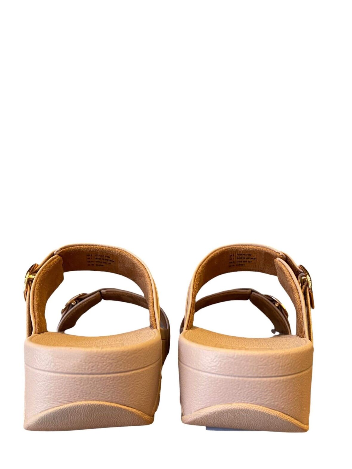 Fitflop slide sandal i farven beige rosa kan k bes hos Helle M i